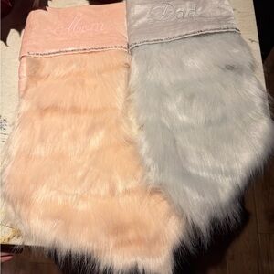 Pottery Barn Monique Lhullier fur stocking engraved with mom and dad.